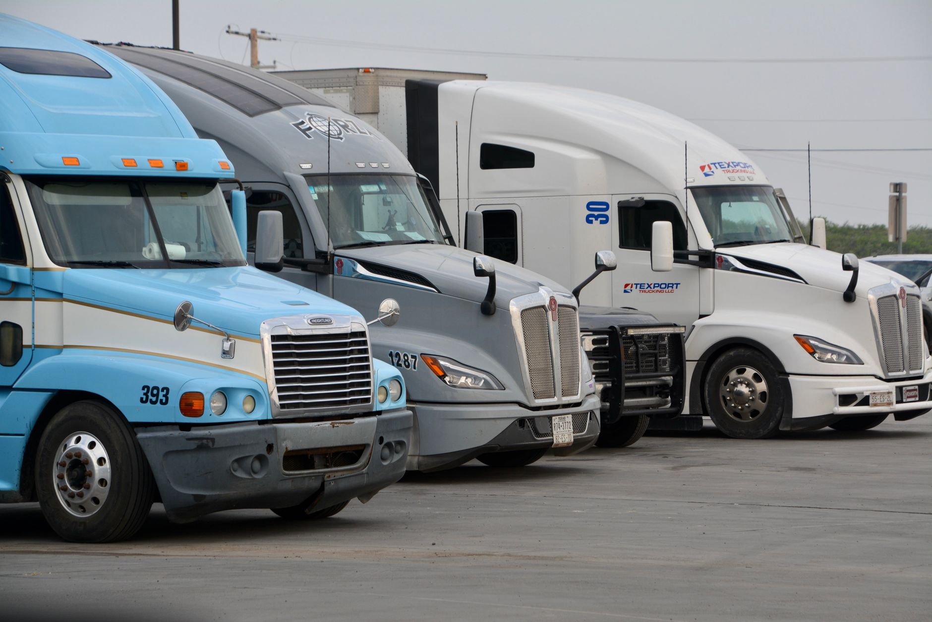 lineup of colorful semi trucks in eagle pass texas
