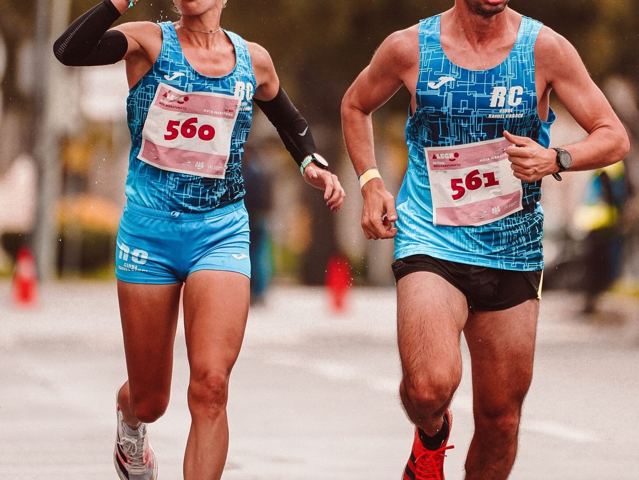 a man and woman running together